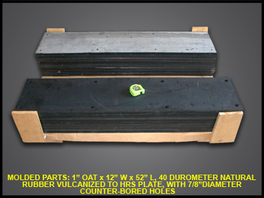 Molded Parts: 1" Oat x 12" W x 52" L, 40 durometer natural rubber vulcanized to hrs plate, with 7/8" diameter counter-bored holes